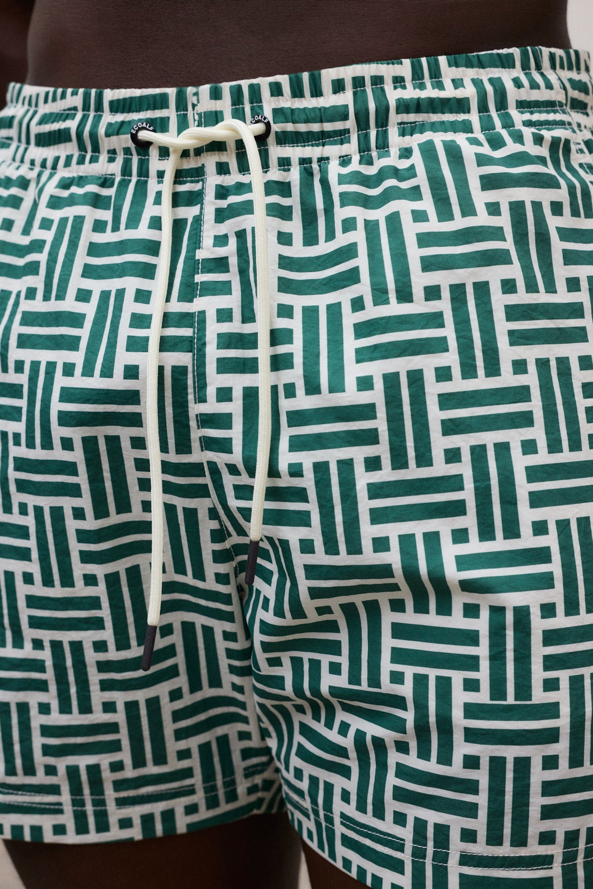 GREEN BEQUIA SWIM TRUNKS