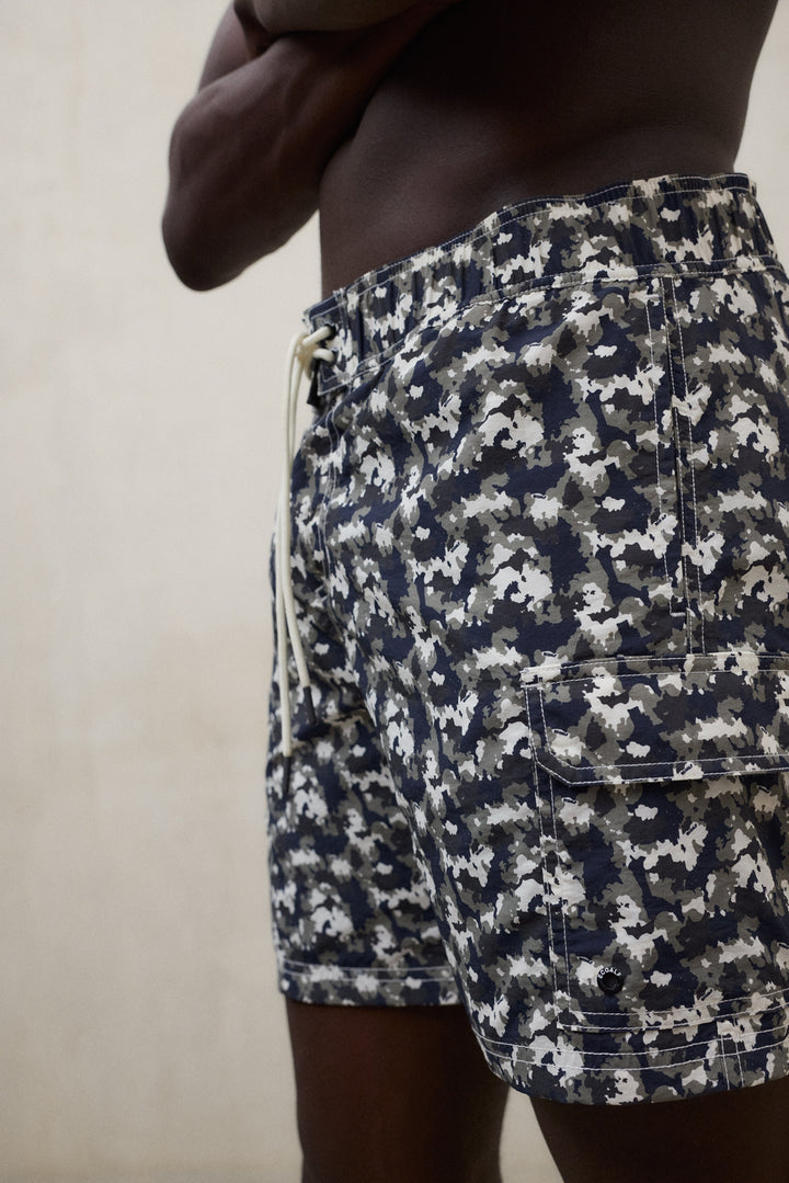 BLACK BIQUE SWIM TRUNKS